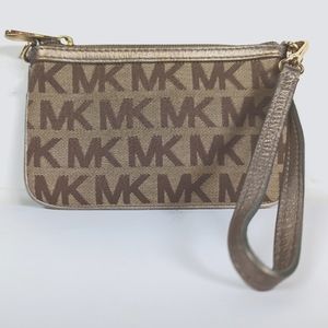 Michael Kors Wristlet in Beige.